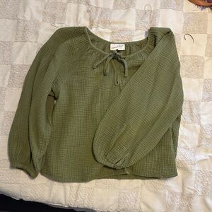 Green textured top.